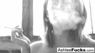 Busty Ashlee Graham smokes while showing off her natural tits
