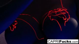 Black-light painted hottie gets a good fucking