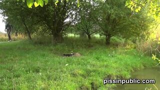 Nature loving girls release their piss streams on the meadow