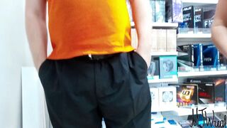 exhibitionist wife teasing the seller in store see-through top