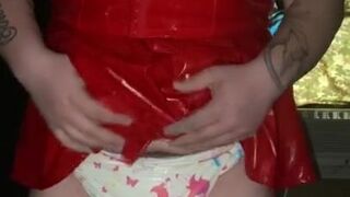 Diaper girl  in red latex outfit