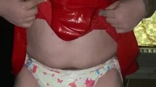 Diaper girl  in red latex outfit