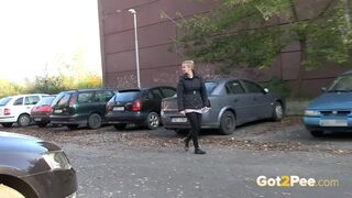 Squatting Between Parked Cars To Piss In Public
