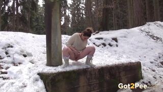 Curvy Babe Filmed Pissing In The Snow