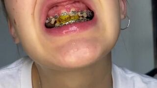 Gigantess with braces chews her tinys