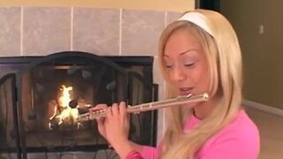 Teen masturbates hard by sticking a flute up deep