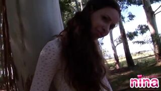 Solo teen fondling her pussy outdoors