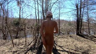 Naked Girl Walking in the spring forest