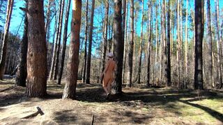 Naked Girl Walking in the spring forest