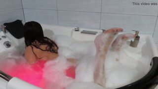 THE BEAUTIFUL MILF GETS ALL WET IN THE FOAM JACUZZI