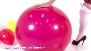 College girl enjoys fucking herself over a balloon or two