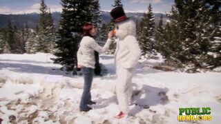 Brandi De Lafey Strokes Frosty the Snowman while Stranded in the Mountains