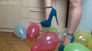 Morrigan Havoc Is Popping Colorful Balloons with Blue High Heels 2014