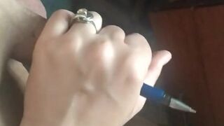 Handjob with a pen in a penis