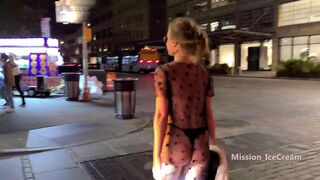 Changing into sheer dress on a busy downtown night