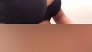 Black Latina in her bathroom showing her pretty tits