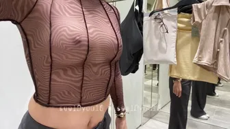 Trying on sheer clothes in dressing room