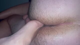 Horny hot milf foot fucks his ass to wake him up with a condom on her foot