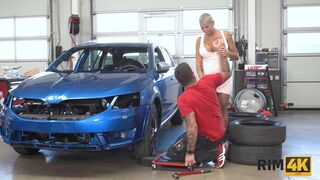 Slovakian MILF with short hair relaxes mechanic by asslicking