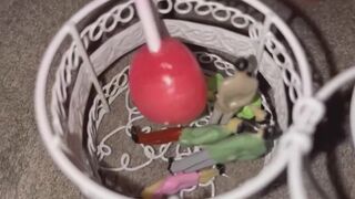 Mia giantess BBW have her tinys in a cage while she sucks a lollipop