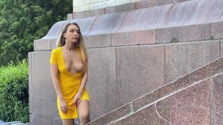 Yelow dress. Topless walk. Beautiful woman expose her tits in public.