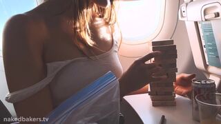 Two hot friends get naked on a plane.