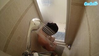 Petite teen shaving pussy on shower cam