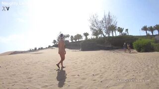 Left the beach naked... (Public nudity)