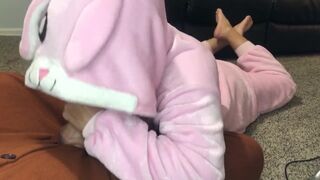 Bunny girl gives foot pose blowjob