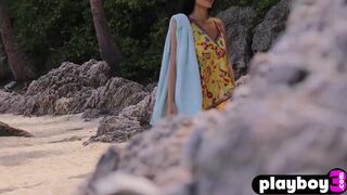 Cute big tits Asian enjoys beach posing