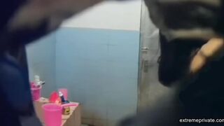Asian aunt spied in bathroom (big tits)