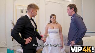 Bride spreads her legs in front of the wedding manager