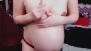 Sexy pregnant babe teasing on webcam