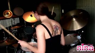 Lesbian Nina Drummer showcasing tits and pussy