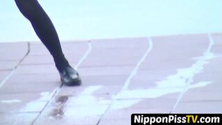 Three Japanese school  pissing hard together openly