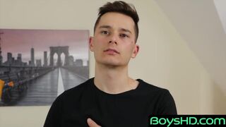 Twink jerks off and pats his dick for us while flashing a hard cock