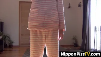 Japanese Chick Awakens And Pees In A Container While On The Floor