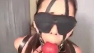 Taming Asian slut with gag, chain and cock