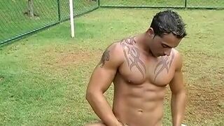 Unusual Brazilian muscle head jerks off on football field solo