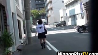 Redhead Japanese with short hair is peeing in the city