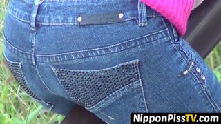 Japanese shocker ruins her jeans as she delivers her piss