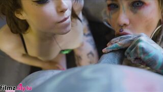 Alt punk girls share a tattooed cock