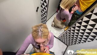 Gf gives a blowjob in the changing booth