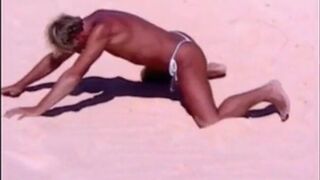 Tanned guy on beach in tiny string thong (temporarily!)