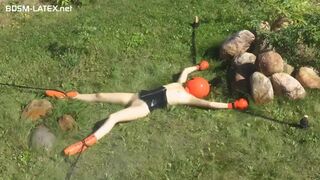 girl tied naked outside