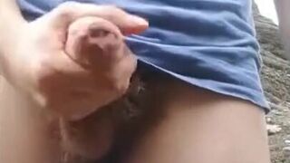 Twink Plays with His Big Cock Outside