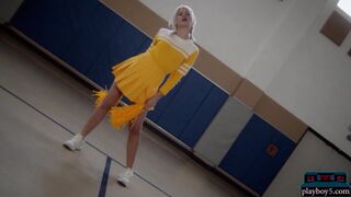 Petite blonde MILF cheerleader stripping