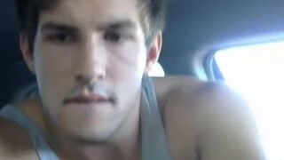 Big-cock jock strokes in his car