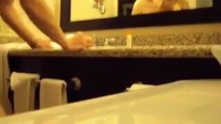 Interracial Couple's Bareback Bathroom Fuck