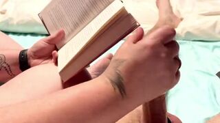 Wife gives me a handjob while reading